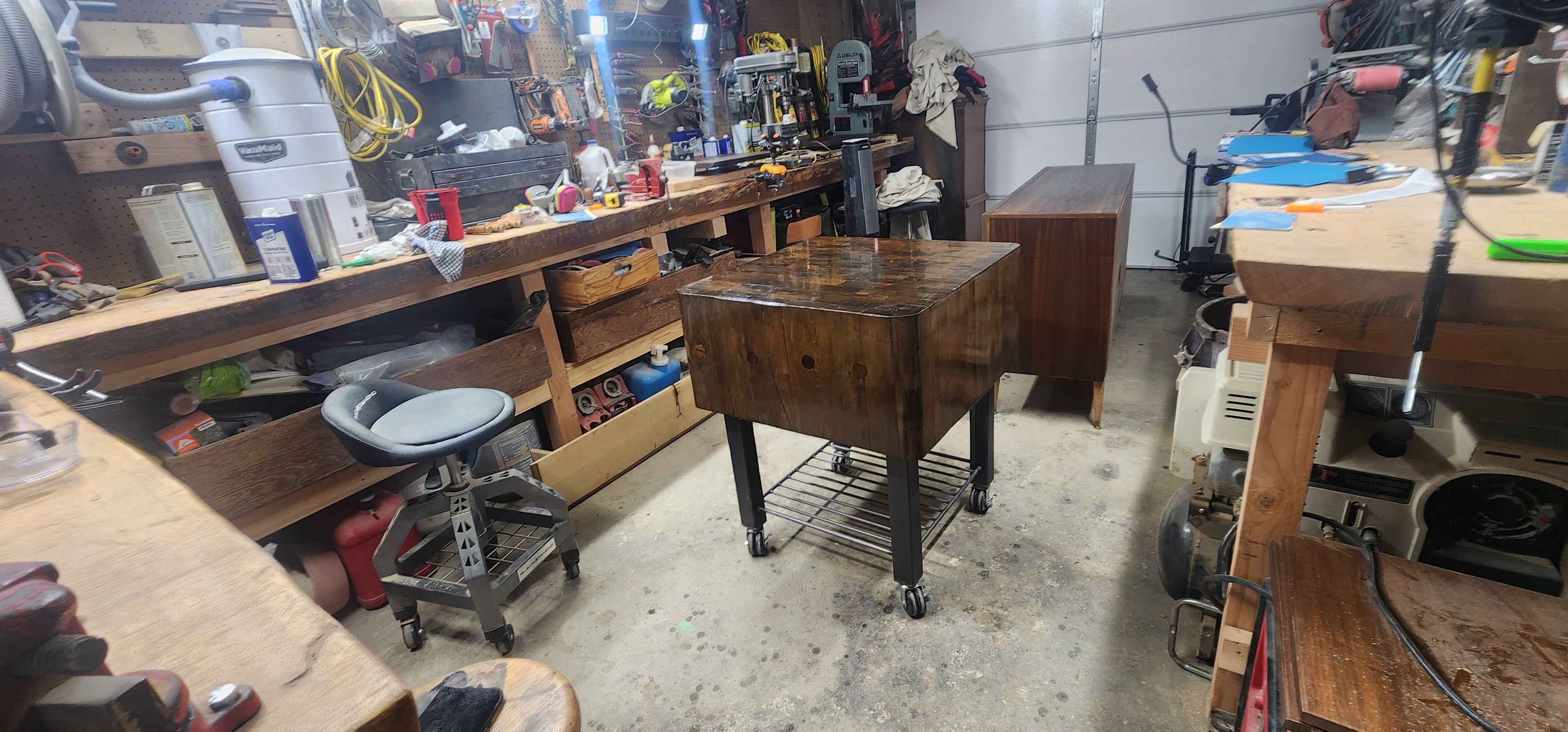 Refinished maple butcher block finished with waterlox and stained dark in shop setting