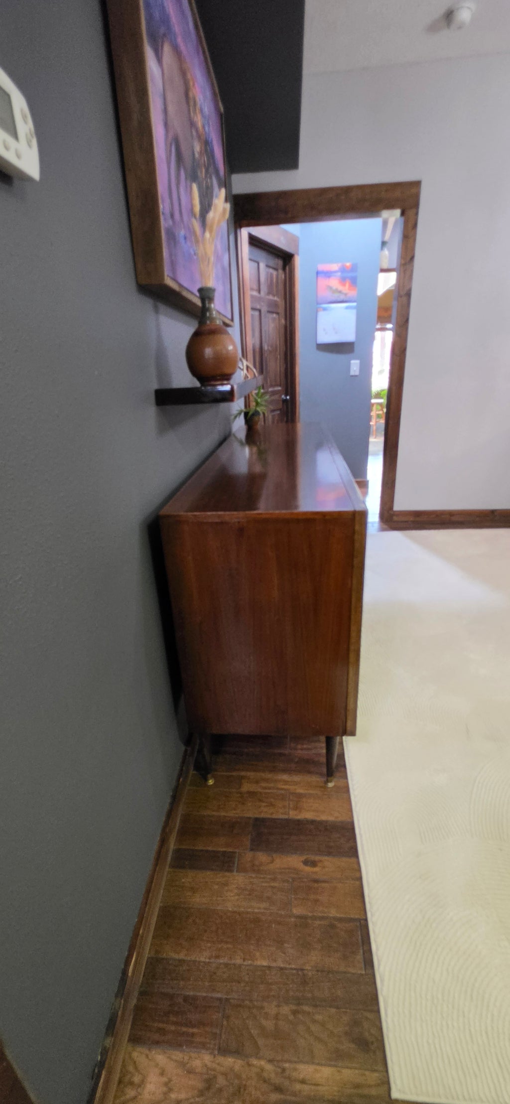 Restored walnut mid-century credenza side view
