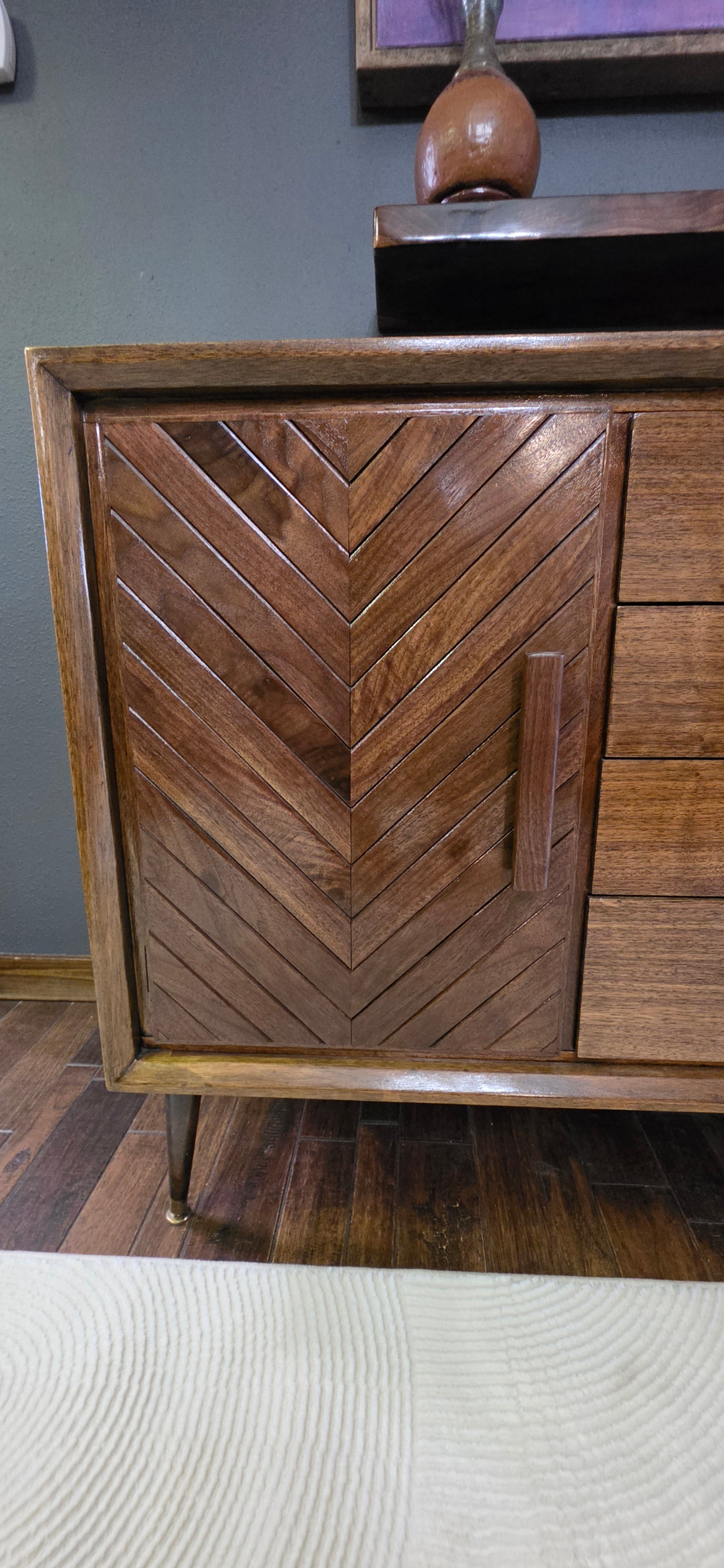 Custom walbnut chevron panels on mid-century credenza