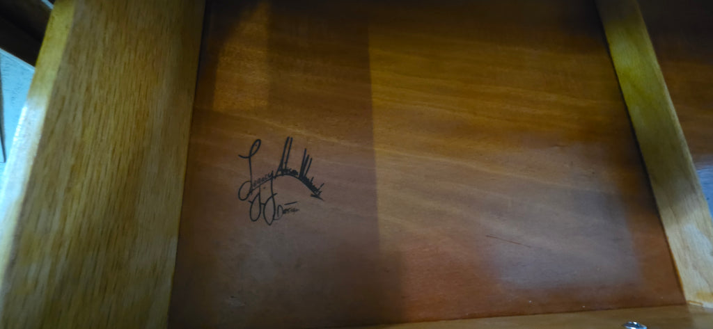 Walnut credenza drawer pull with makers mark